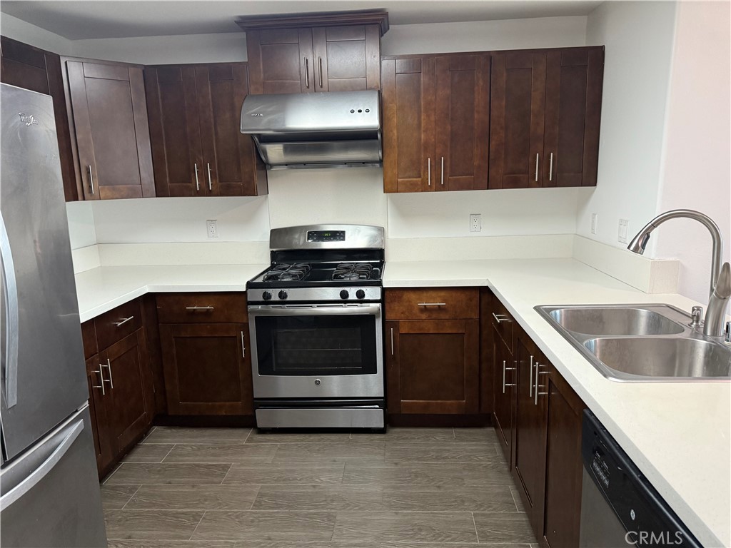 11 South 3rd Street, Unit 218 Alhambra, CA 91801 - Photo 20 of 21 a kitchen with a stove and a sink