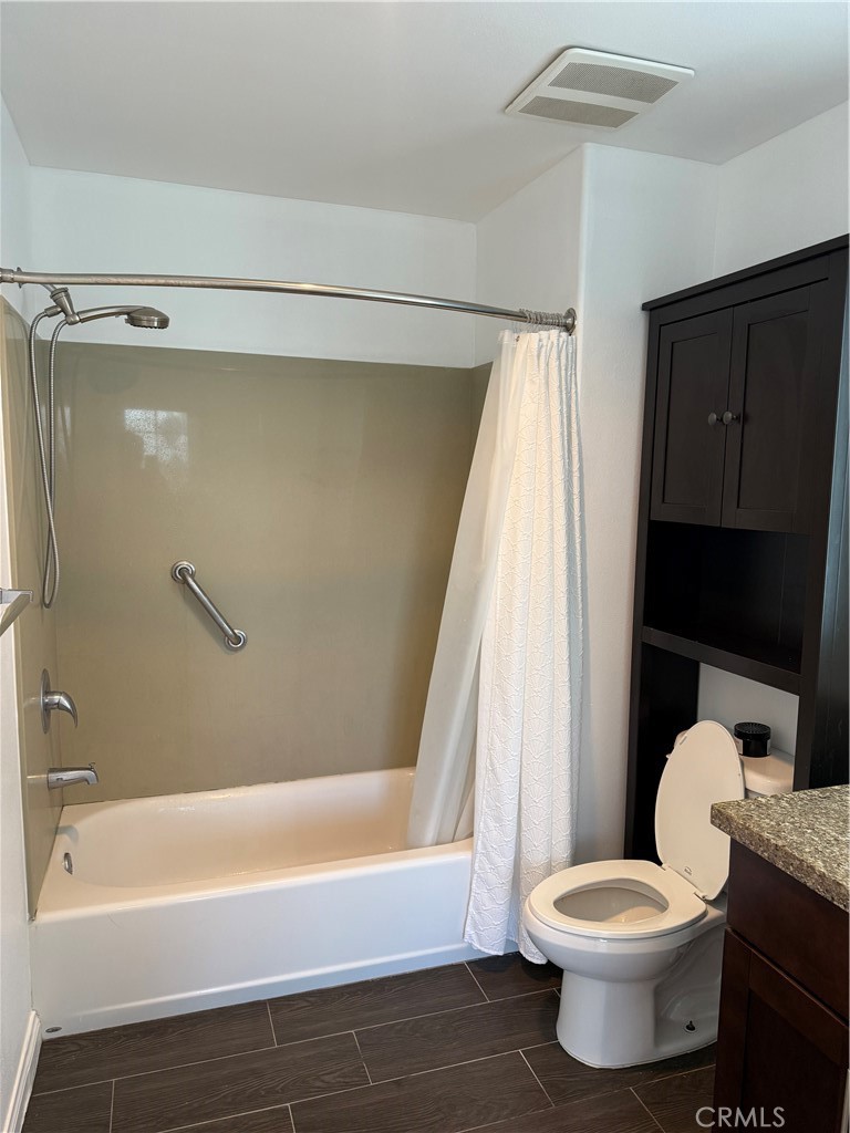 11 South 3rd Street, Unit 218 Alhambra, CA 91801 - Photo 10 of 21 a bathroom with a bathtub and toilet