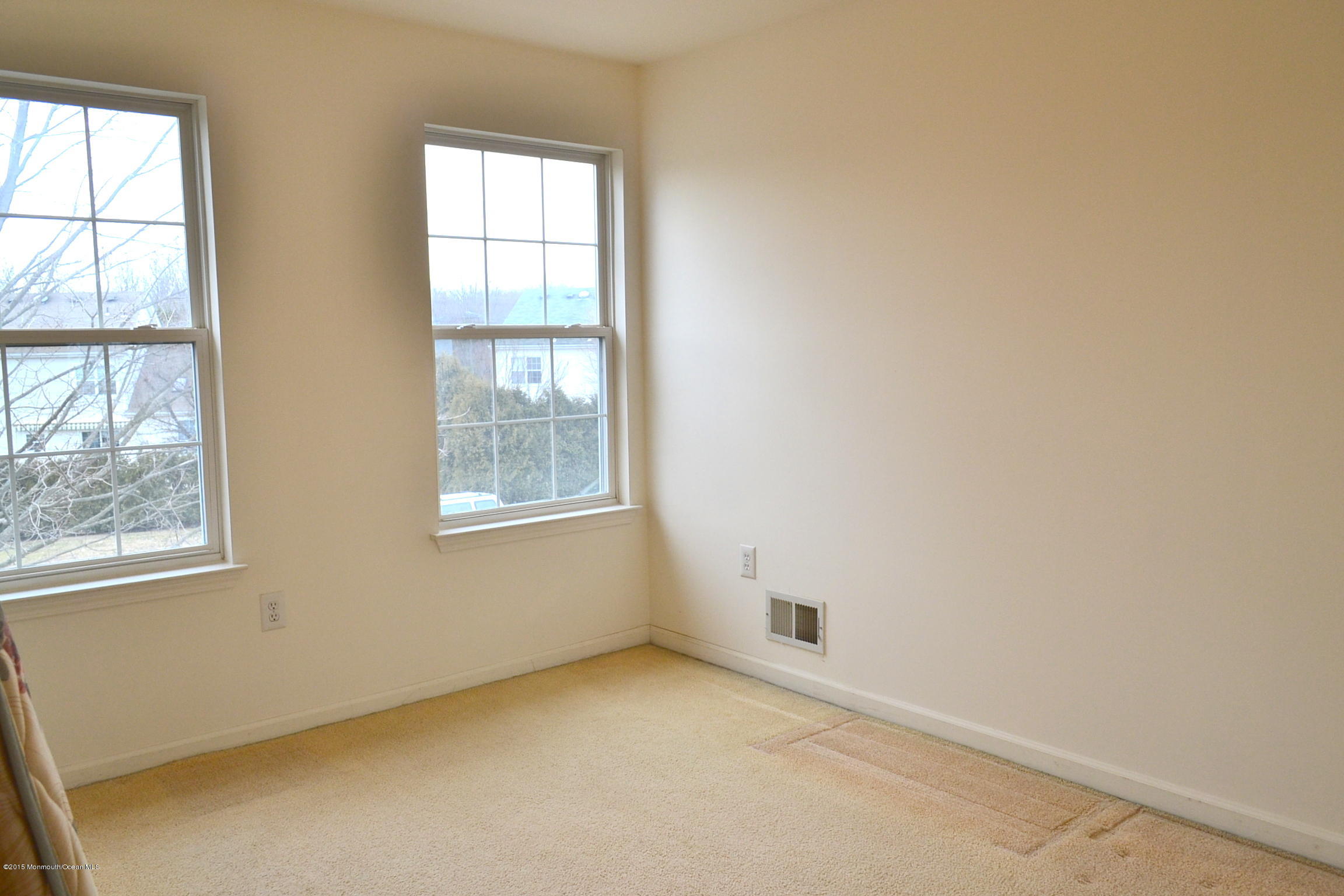 23 Bernadette Road Morganville, NJ 07751 - Photo 17 of 26 an empty room with windows