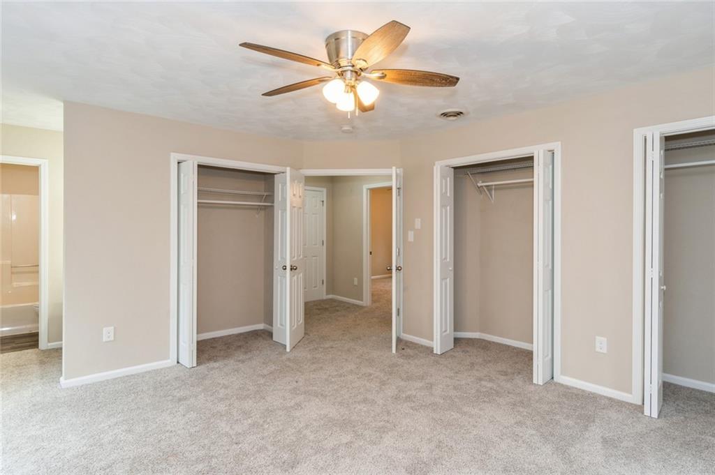 218 Chestnut Lane Chalk Hill, PA 15421 - Photo 11 of 18 a view of an empty room with a ceiling fan