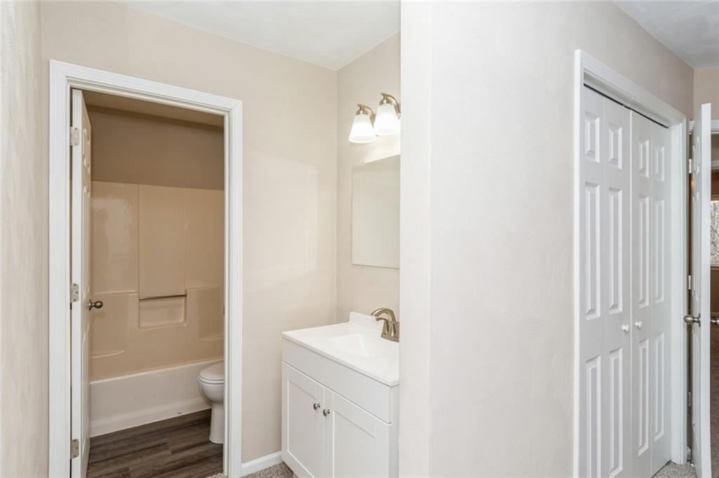 218 Chestnut Lane Chalk Hill, PA 15421 - Photo 15 of 18 a bathroom with a sink a toilet and shower