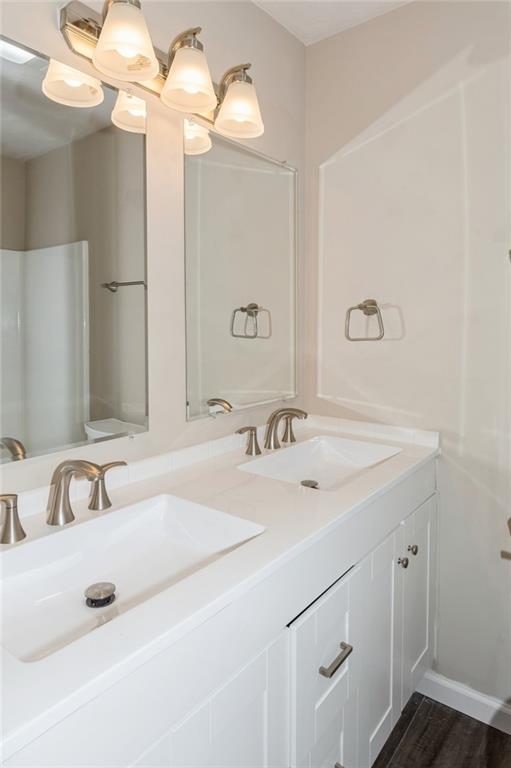 218 Chestnut Lane Chalk Hill, PA 15421 - Photo 16 of 18 a bathroom with a sink and a mirror