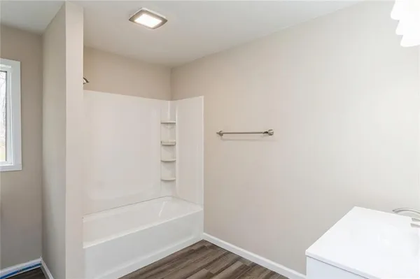 a bathroom with a bathtub
