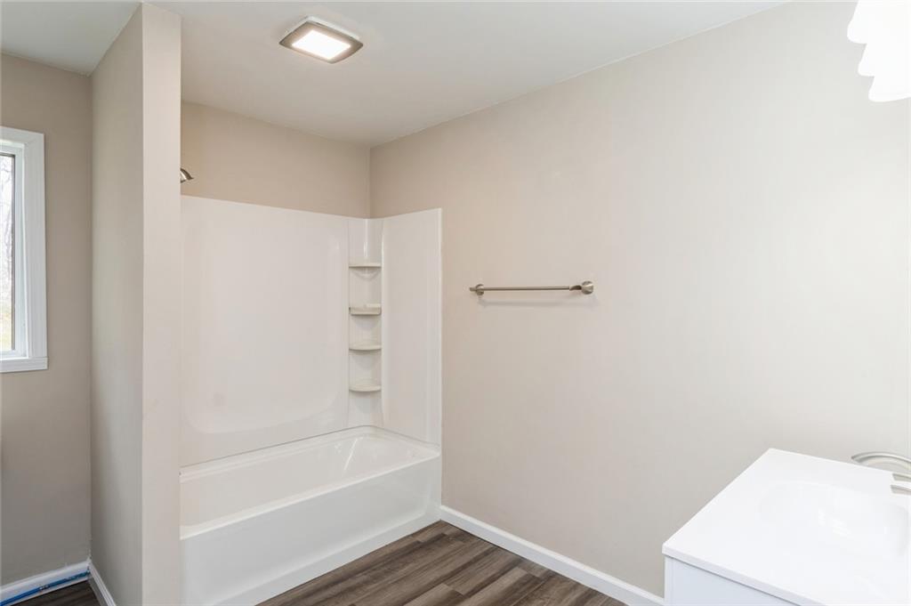 218 Chestnut Lane Chalk Hill, PA 15421 - Photo 17 of 18 a bathroom with a bathtub