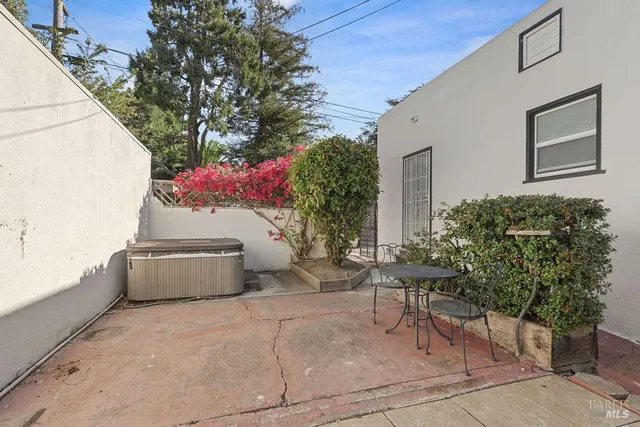 a backyard of a house with seating space