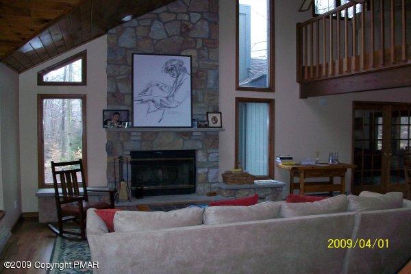 8 Red Spruce Road Pocono Pines, PA 18350 - Photo 7 of 9 living room with fireplace