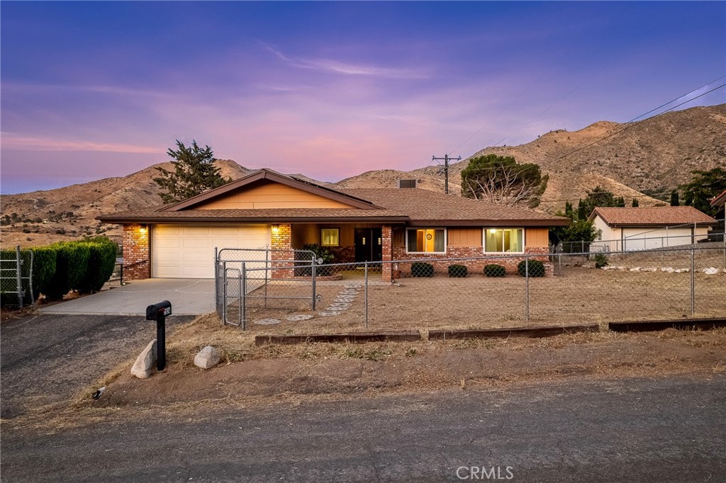2924 Raccoon Drive Lake Isabella, CA 93240 - Photo 28 of 33 a front view of a house with a yard