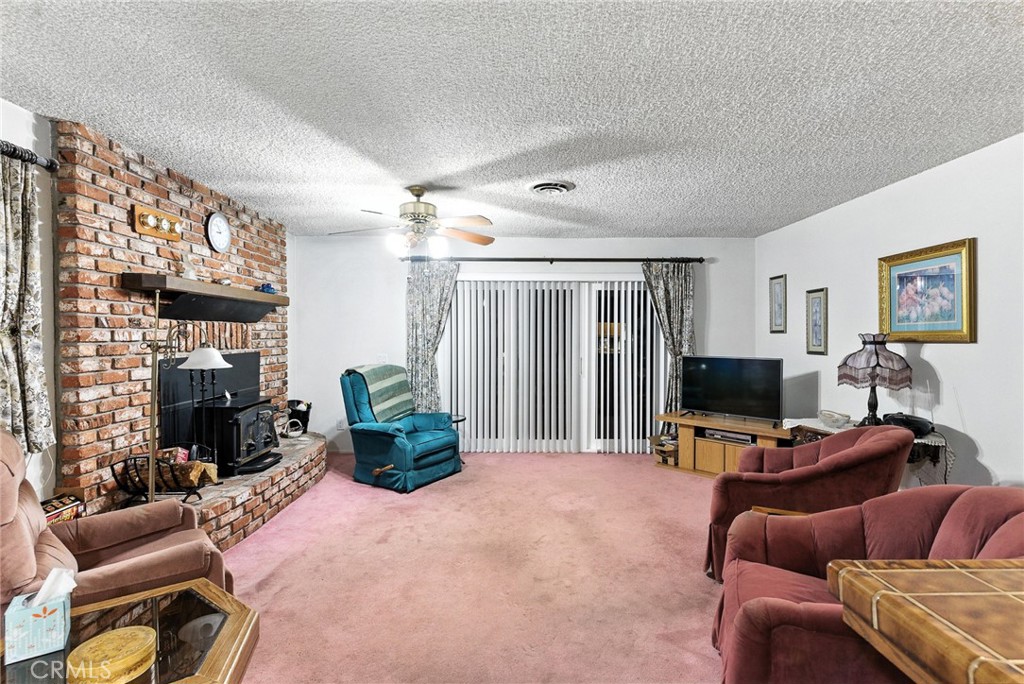 2924 Raccoon Drive Lake Isabella, CA 93240 - Photo 7 of 33 a living room with furniture gym equipment and a flat screen tv