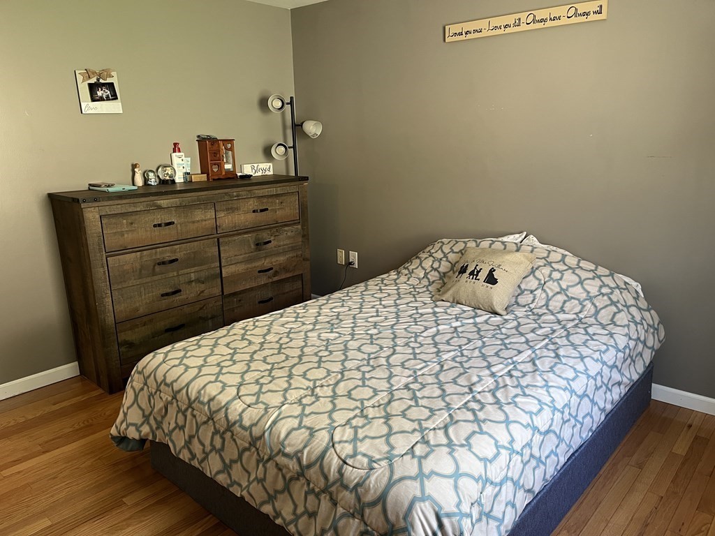 86 East Buckland Road Buckland, MA 01370 - Photo 22 of 39 a bedroom with a bed and a dresser