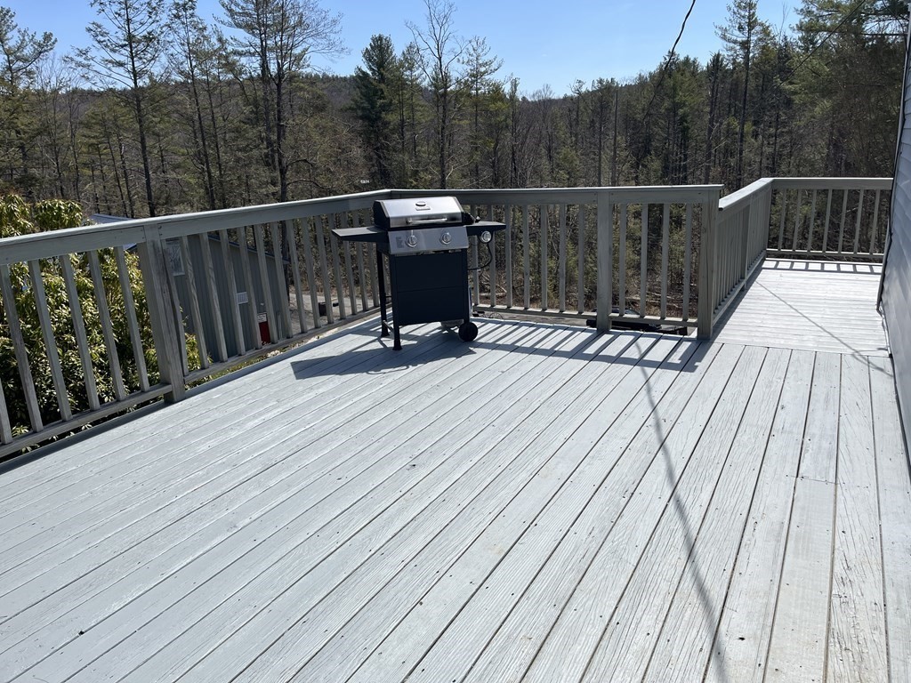 86 East Buckland Road Buckland, MA 01370 - Photo 26 of 39 a view of balcony with wooden floor and fence