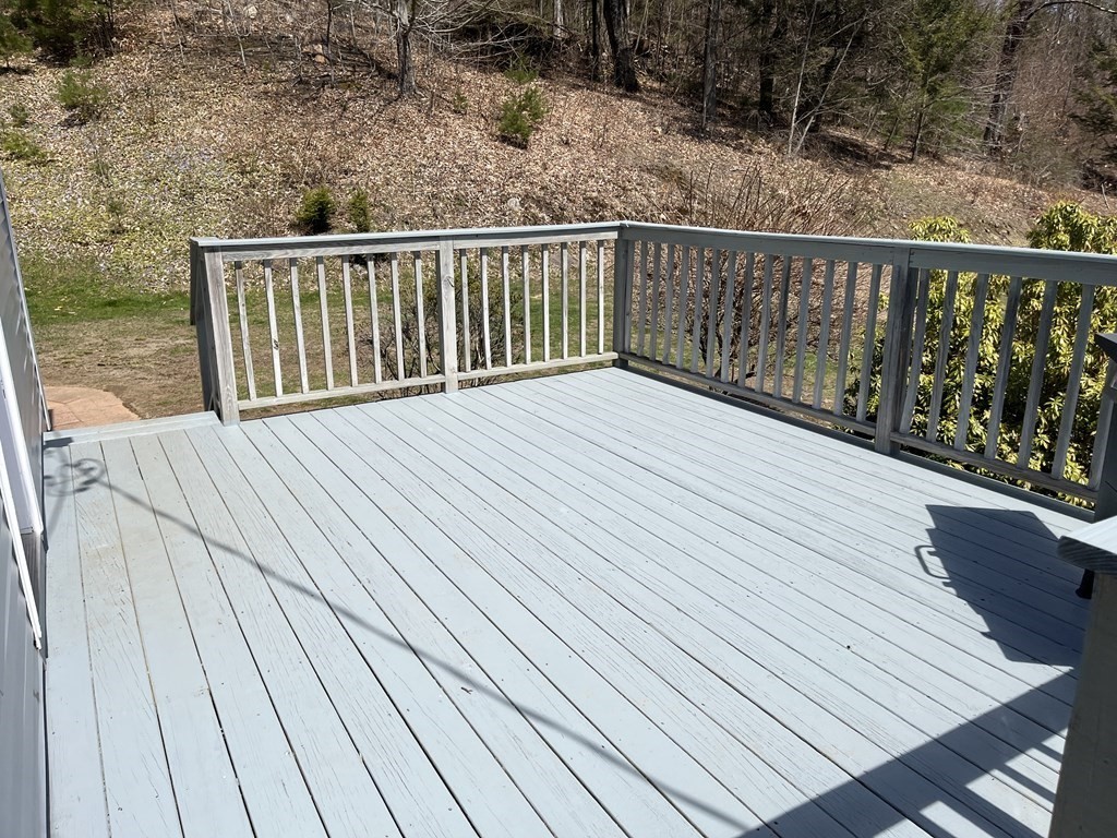 86 East Buckland Road Buckland, MA 01370 - Photo 27 of 39 a balcony with wooden floor