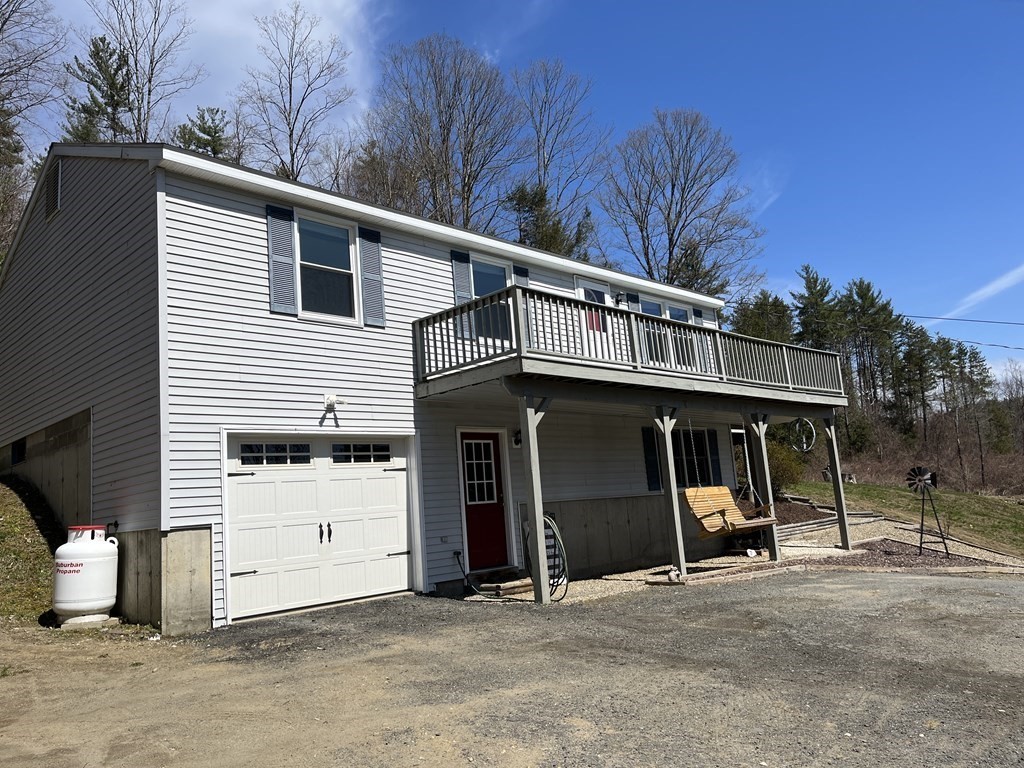 86 East Buckland Road Buckland, MA 01370 - Photo 8 of 39 a view of a house with a garage