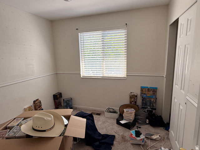 183 East 820 South Centerville, UT 84014 - Photo 11 of 14 Room featuring neutral walls with chair rail molding, a window with horizontal blinds, and recessed ceiling lighting