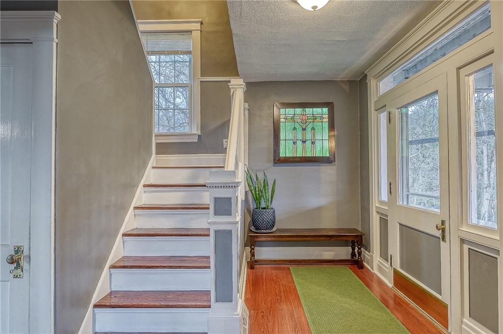 7520 Noblestown Road McDonald, PA 15057 - Photo 3 of 25 a view of an entryway with wooden floor and a front door