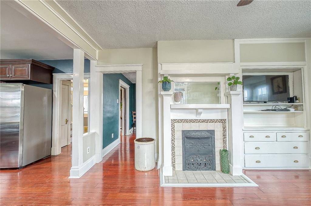 7520 Noblestown Road McDonald, PA 15057 - Photo 7 of 25 a view of an entryway with hallway and wooden floor