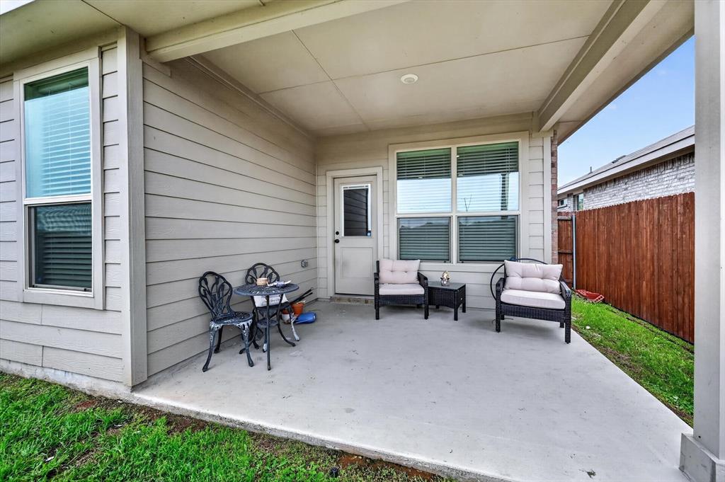 9604 Cherryville Road Fort Worth, TX 76108 - Photo 32 of 40 Covered concrete patio with recessed lighting