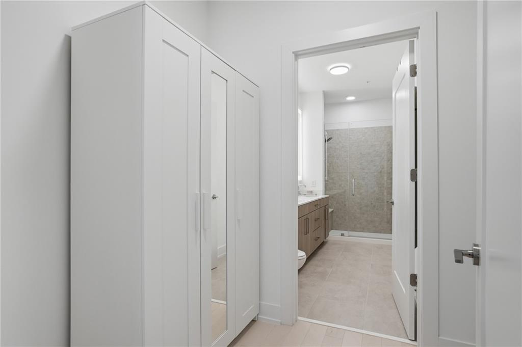 775 Juniper Street Northeast, Unit 322 Atlanta, GA 30308 - Photo 12 of 34 a bathroom with a shower and a sink