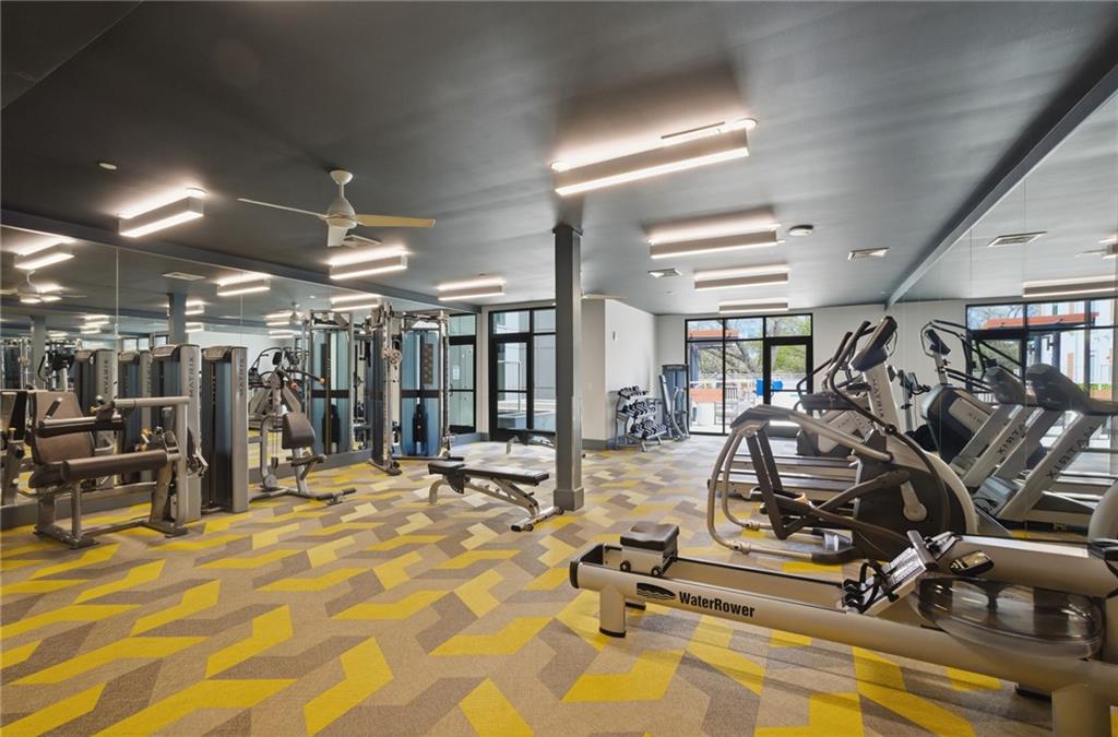 775 Juniper Street Northeast, Unit 322 Atlanta, GA 30308 - Photo 22 of 34 a view of a room with gym equipment