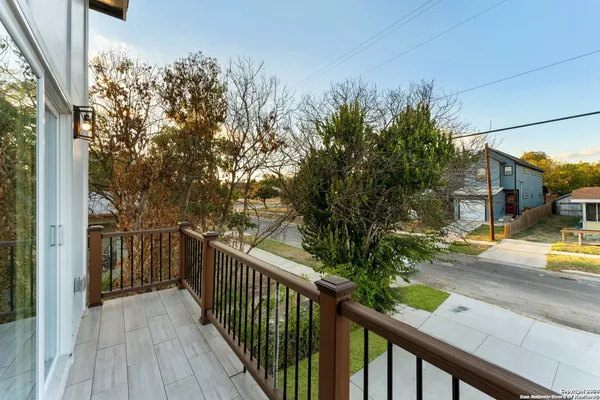a view of a balcony with chair