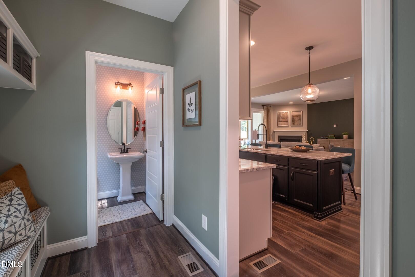 326 Oak Meadow Lane Angier, NC 27501 - Photo 17 of 41 a kitchen view with a sink and a refrigerator