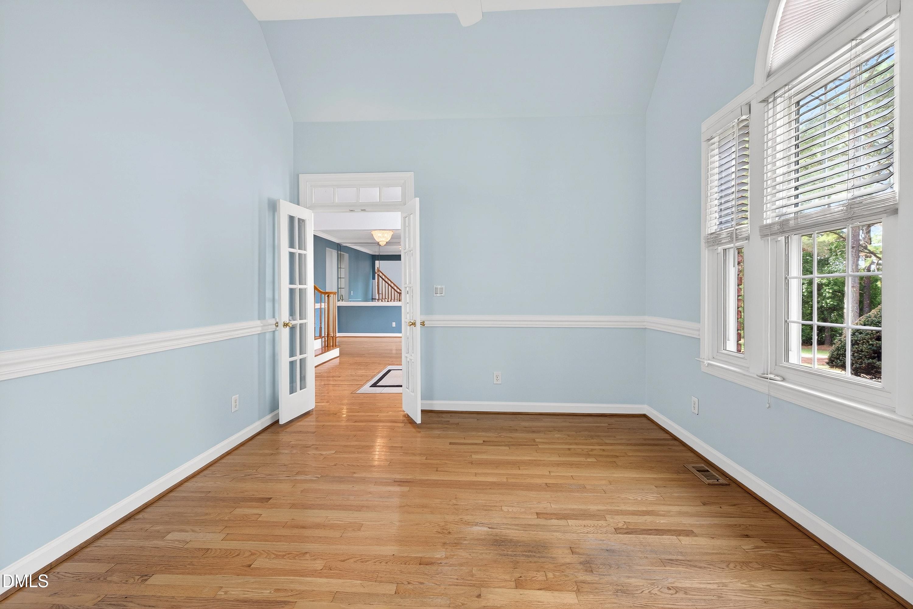 2217 Moss Point Lane Raleigh, NC 27606 - Photo 15 of 70 a view of an empty room with a window