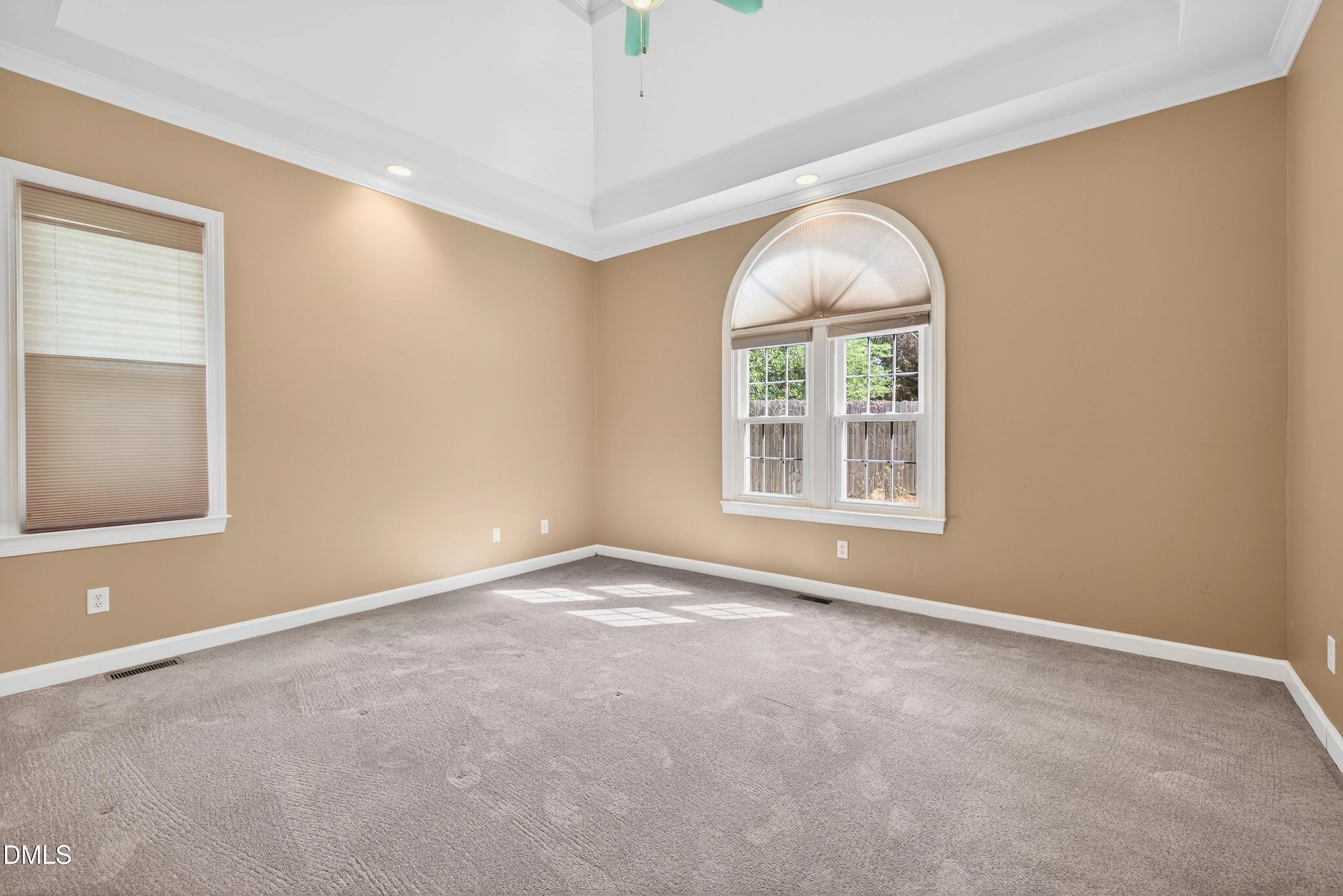 2217 Moss Point Lane Raleigh, NC 27606 - Photo 24 of 70 an empty room with windows and closet