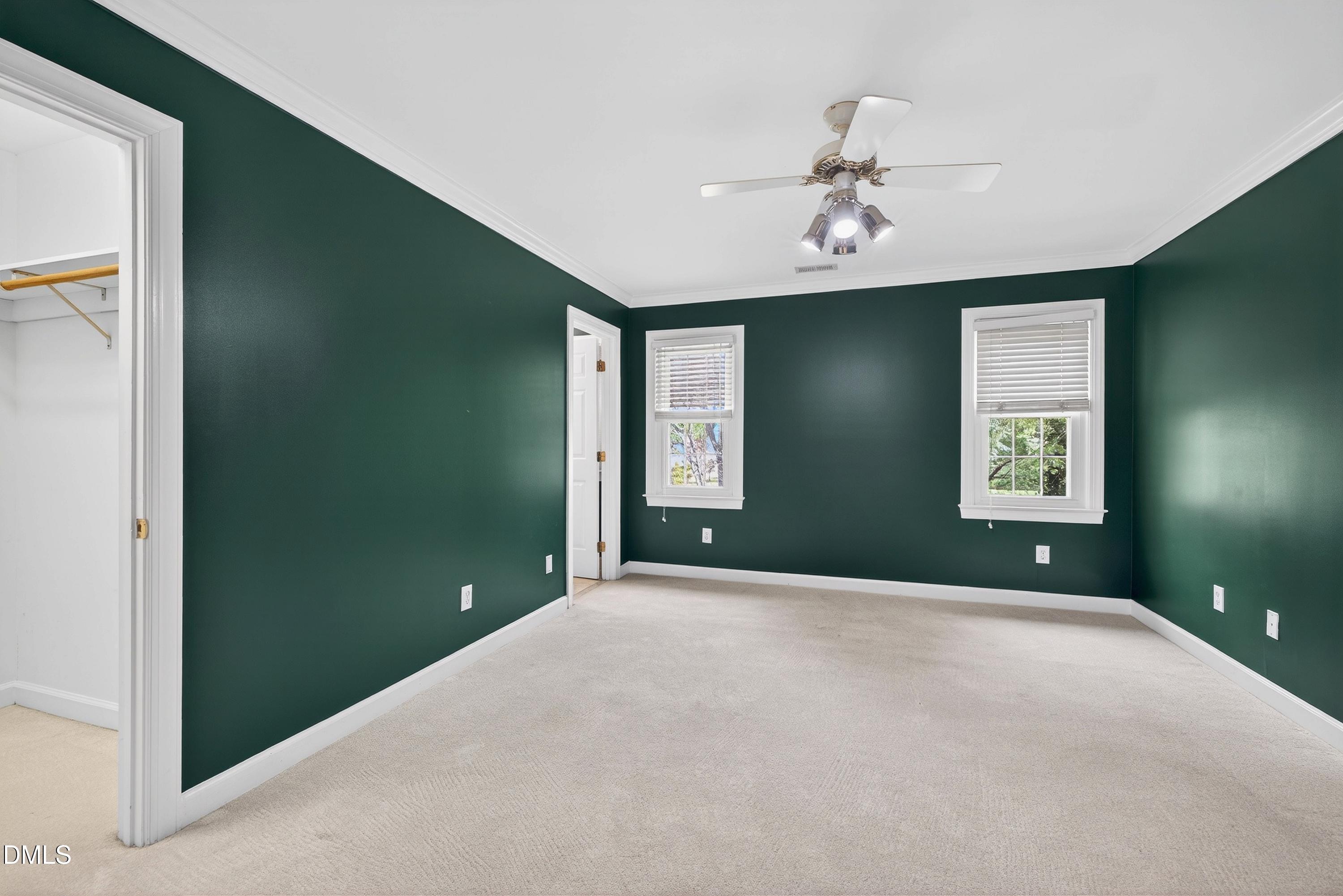 2217 Moss Point Lane Raleigh, NC 27606 - Photo 36 of 70 a view of an empty room with window and cabinet