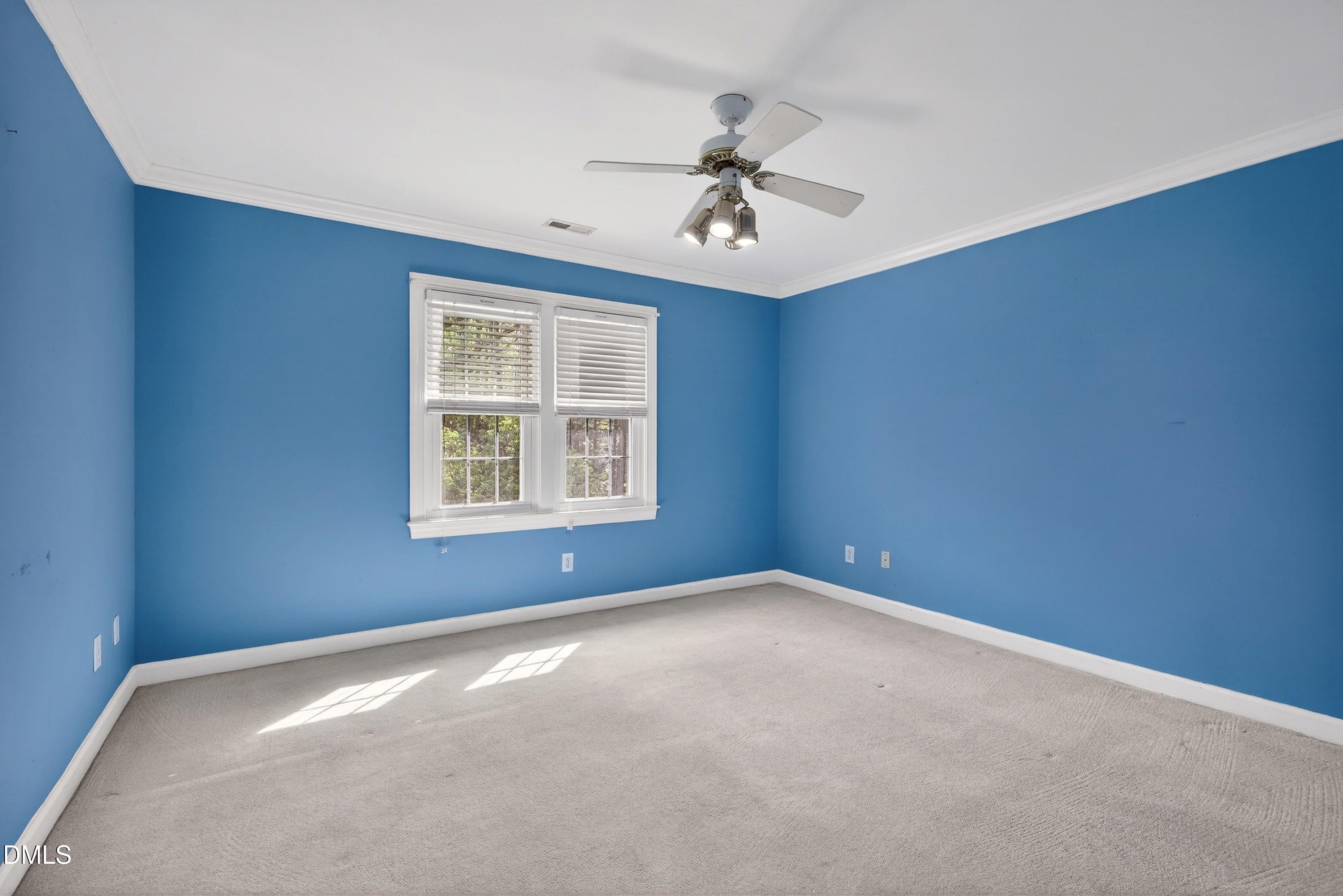 2217 Moss Point Lane Raleigh, NC 27606 - Photo 44 of 70 a view of an empty room with a window