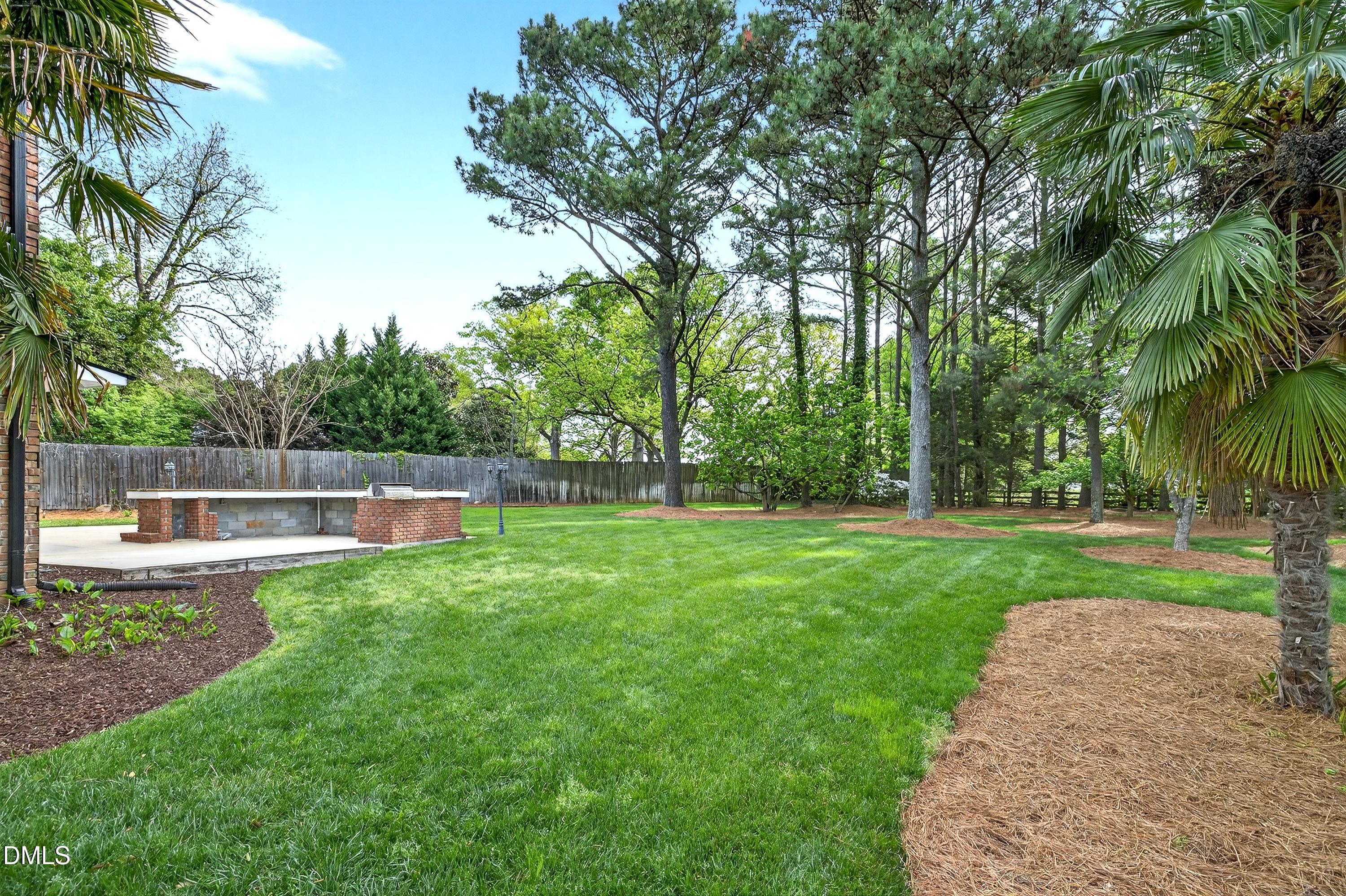 2217 Moss Point Lane Raleigh, NC 27606 - Photo 54 of 70 a view of a backyard with swimming pool