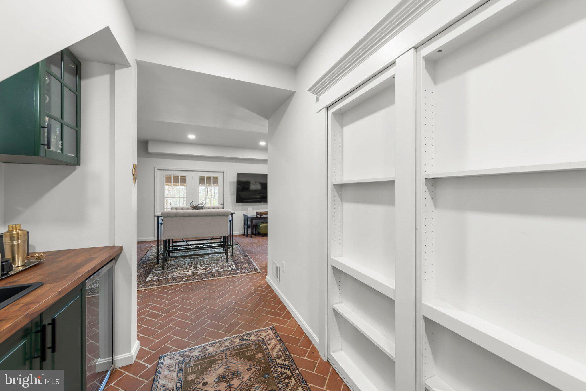 448 Adams Road Winchester, VA 22603 - Photo 29 of 96 Charming hallway with rustic tiles.