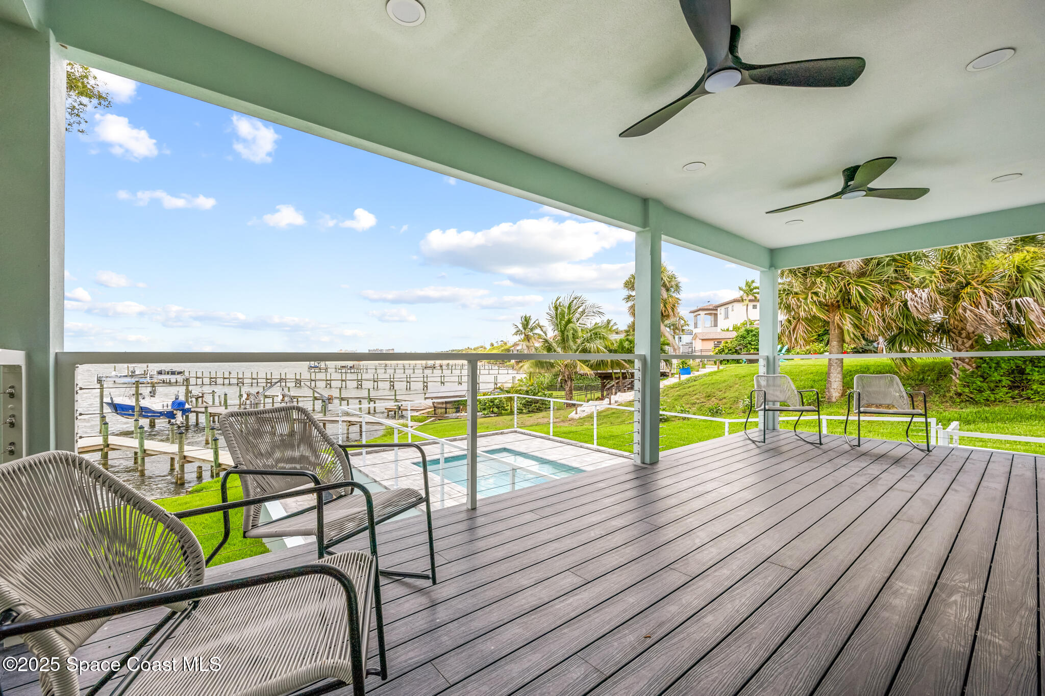 1313 Worth Court Northeast Palm Bay, FL 32905 - Photo 25 of 77 a view of a balcony with wooden floor