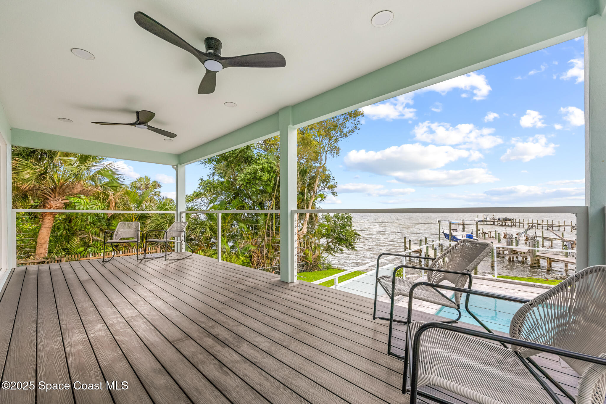 1313 Worth Court Northeast Palm Bay, FL 32905 - Photo 26 of 77 a view of a balcony with furniture
