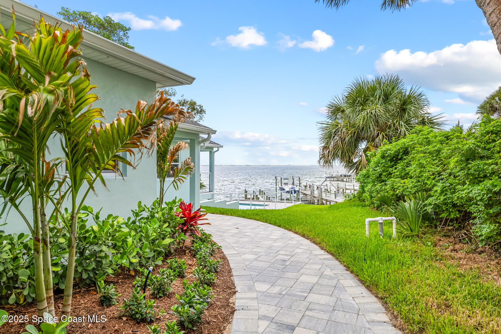 1313 Worth Court Northeast Palm Bay, FL 32905 - Photo 3 of 77 Sidewalk