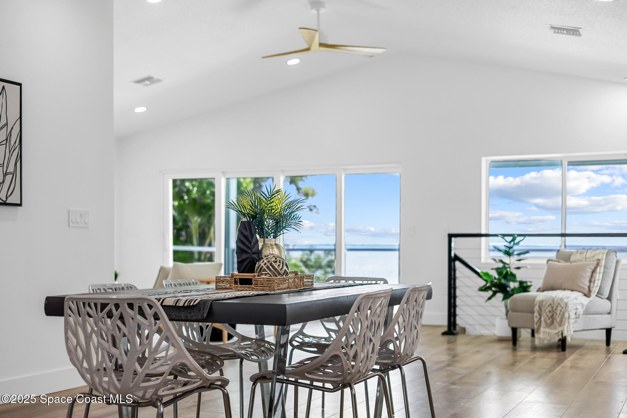 1313 Worth Court Northeast Palm Bay, FL 32905 - Photo 32 of 77 a view of a dining room with furniture window and wooden floor