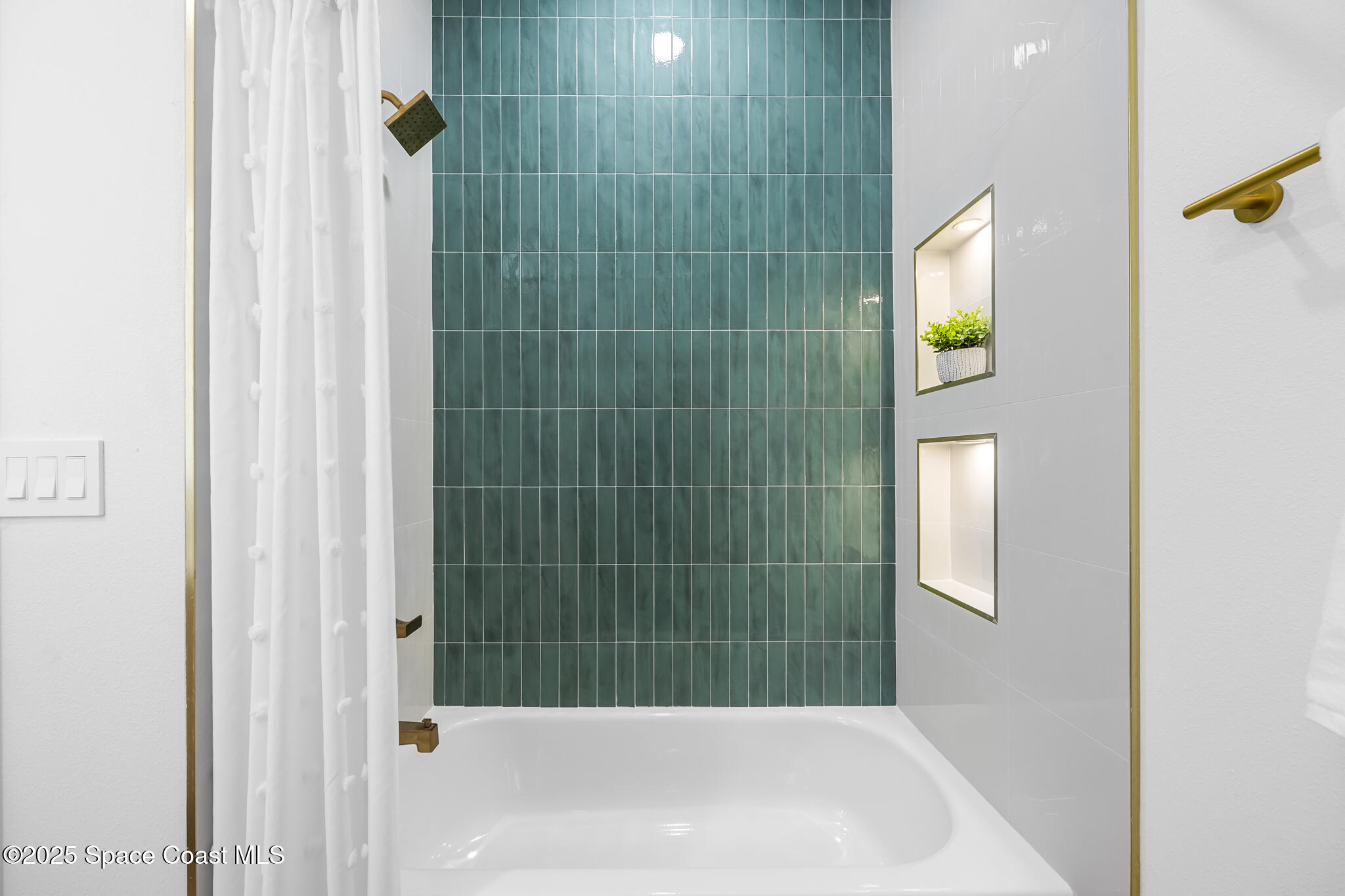 1313 Worth Court Northeast Palm Bay, FL 32905 - Photo 45 of 77 a bathroom with a bathtub and shower