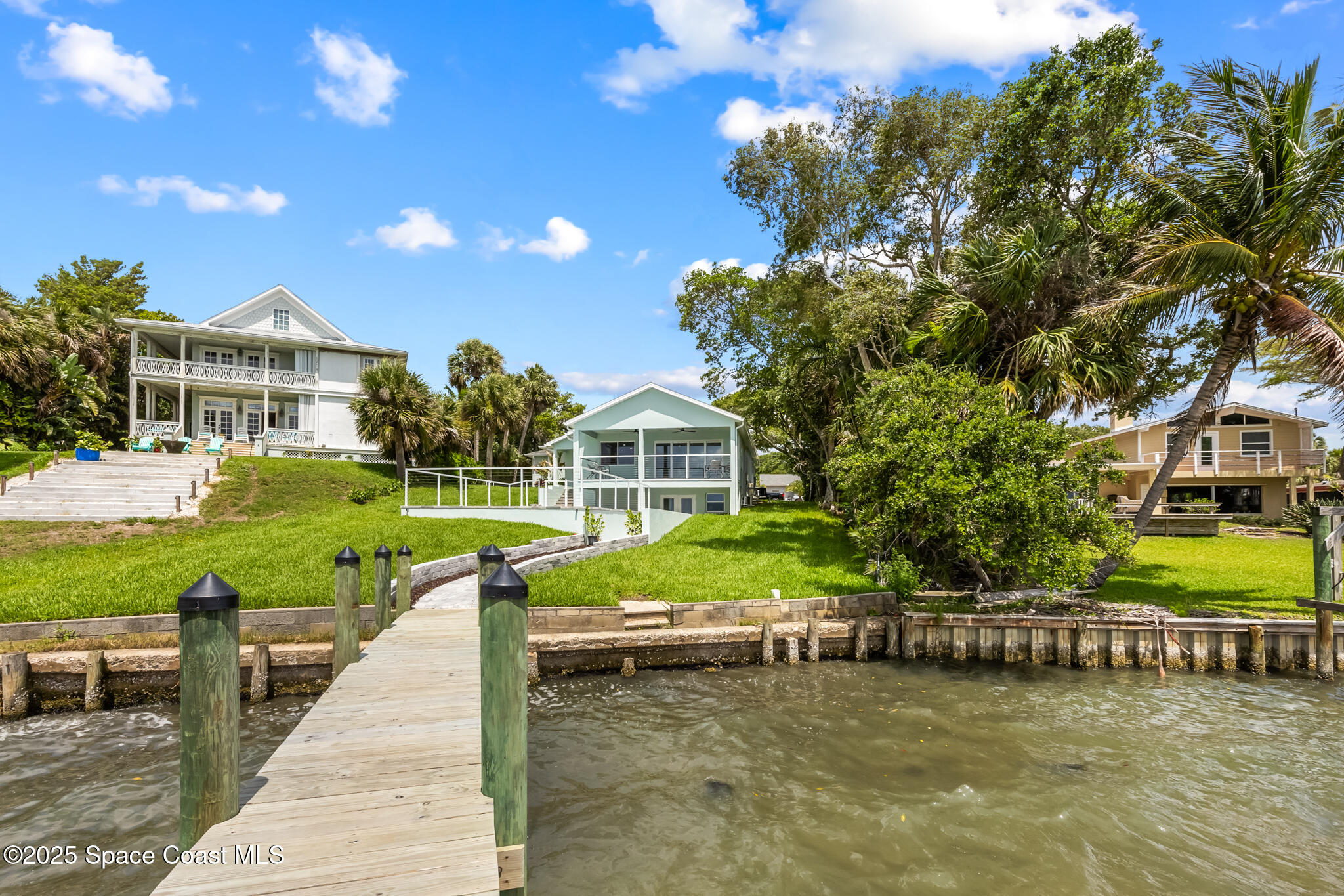 1313 Worth Court Northeast Palm Bay, FL 32905 - Photo 64 of 77 a view of a house with a yard