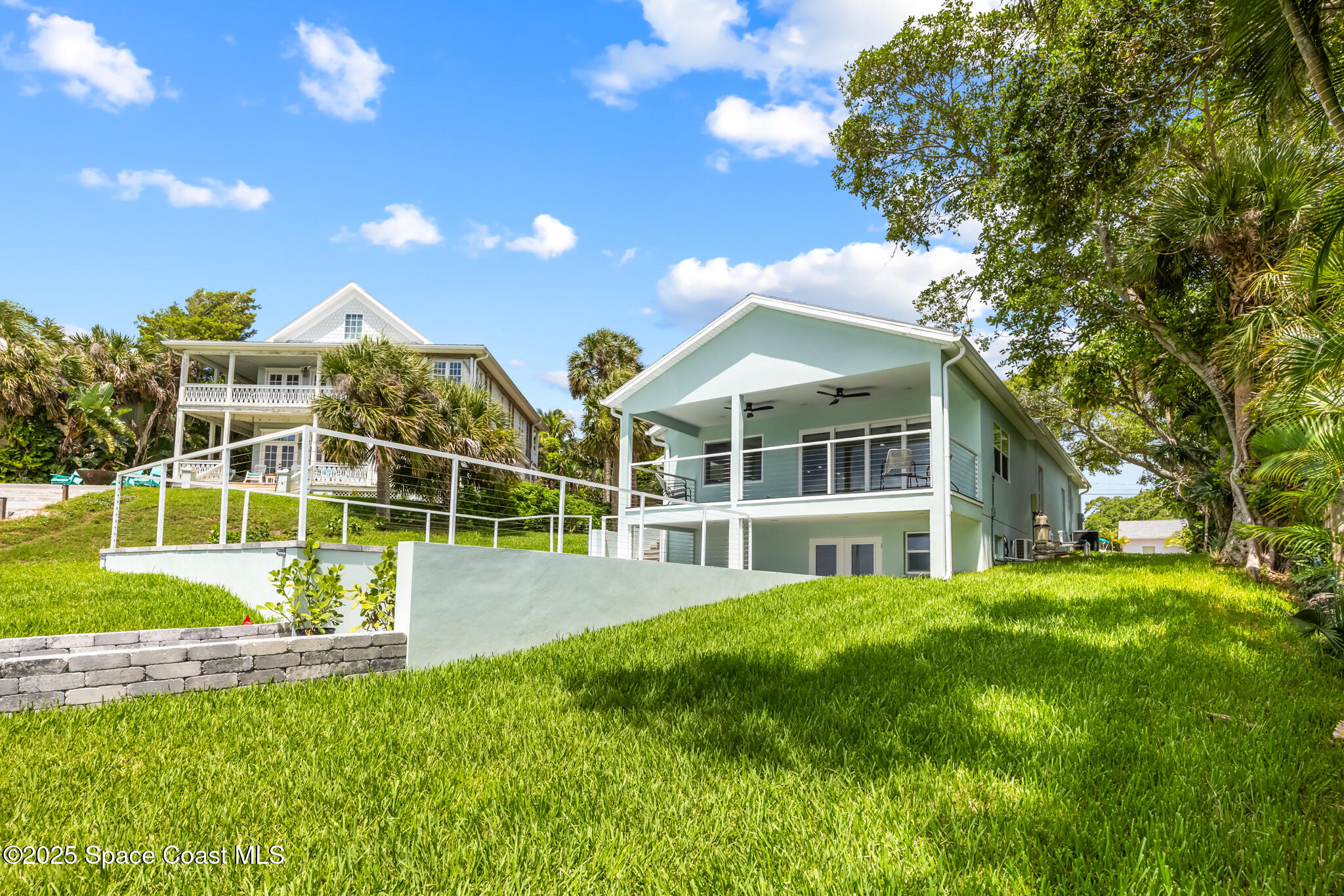 1313 Worth Court Northeast Palm Bay, FL 32905 - Photo 76 of 77 a view of a house with a big yard