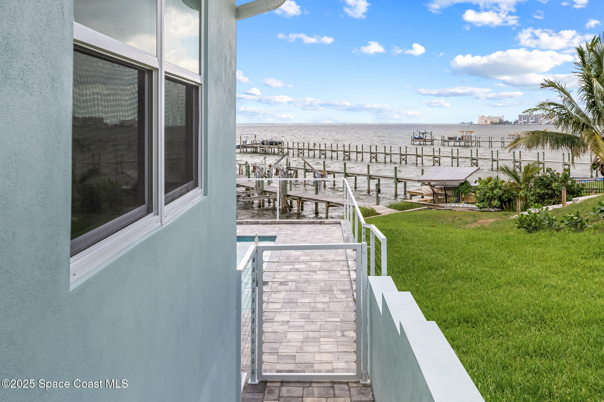 1313 Worth Court Northeast Palm Bay, FL 32905 - Photo 8 of 77 Side Yard