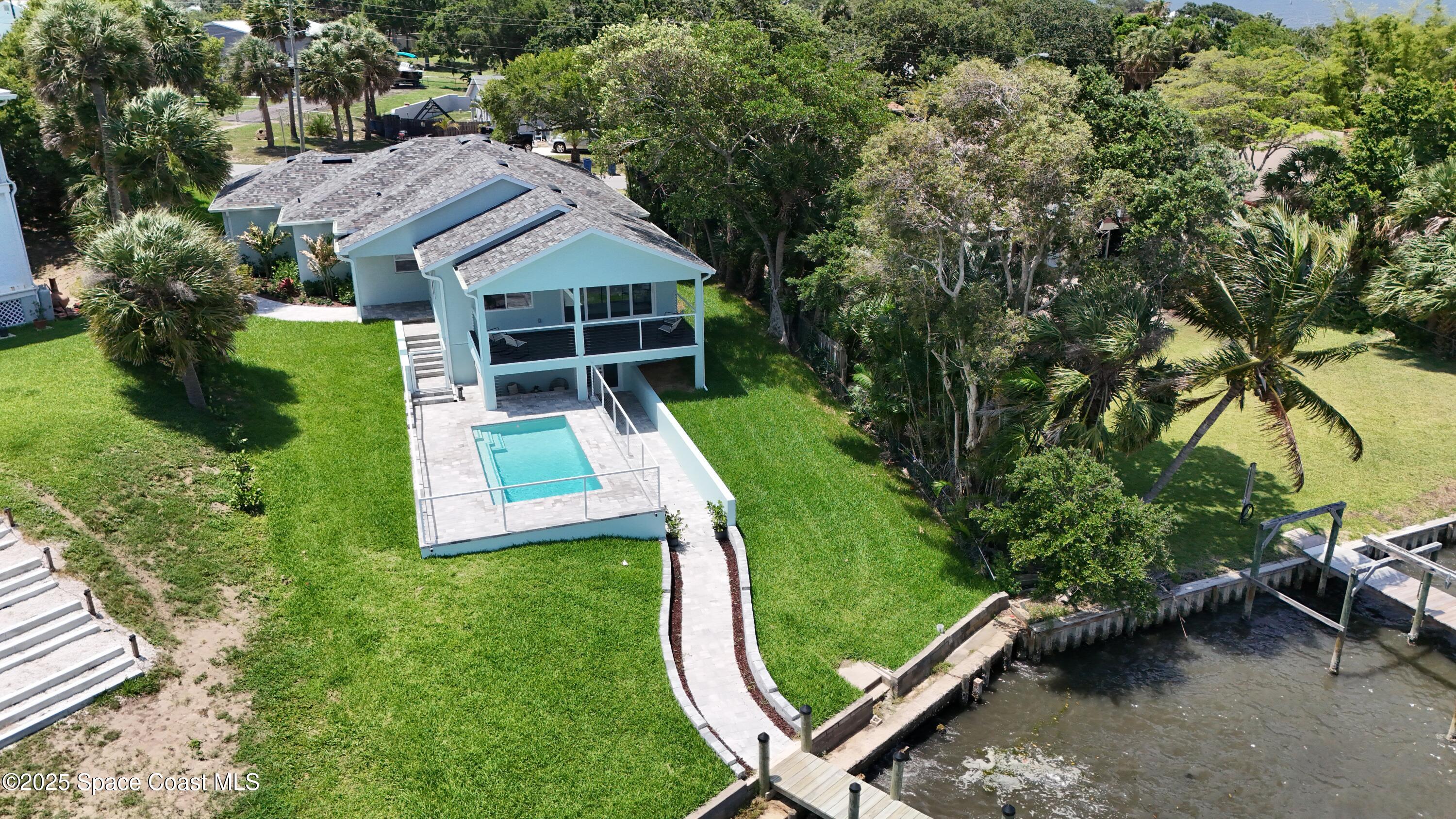 1313 Worth Court Northeast Palm Bay, FL 32905 - Photo 9 of 77 an aerial view of a house