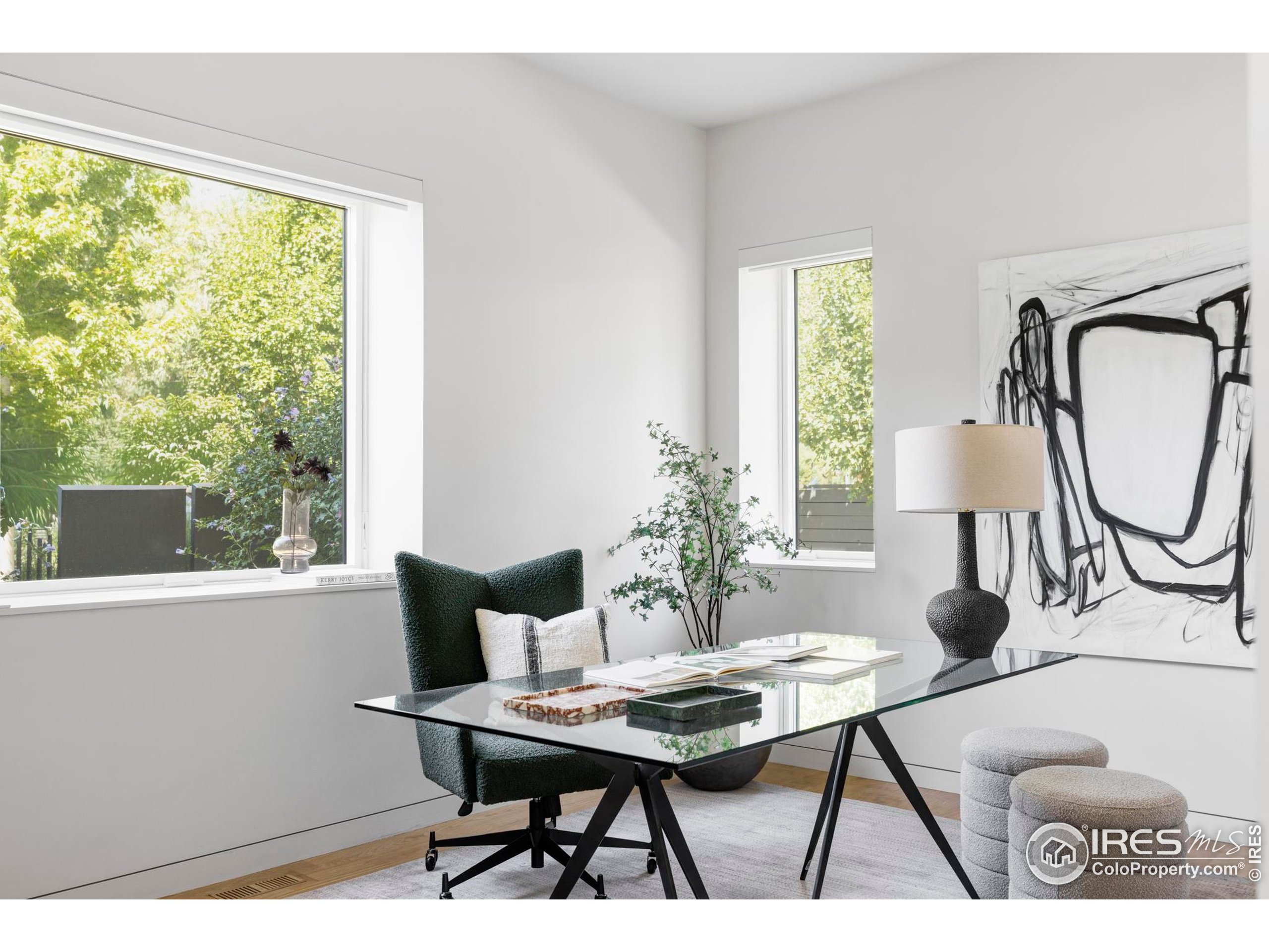 2670 6th Street Boulder, CO 80304 - Photo 12 of 30 a living room with furniture a window and a potted plant