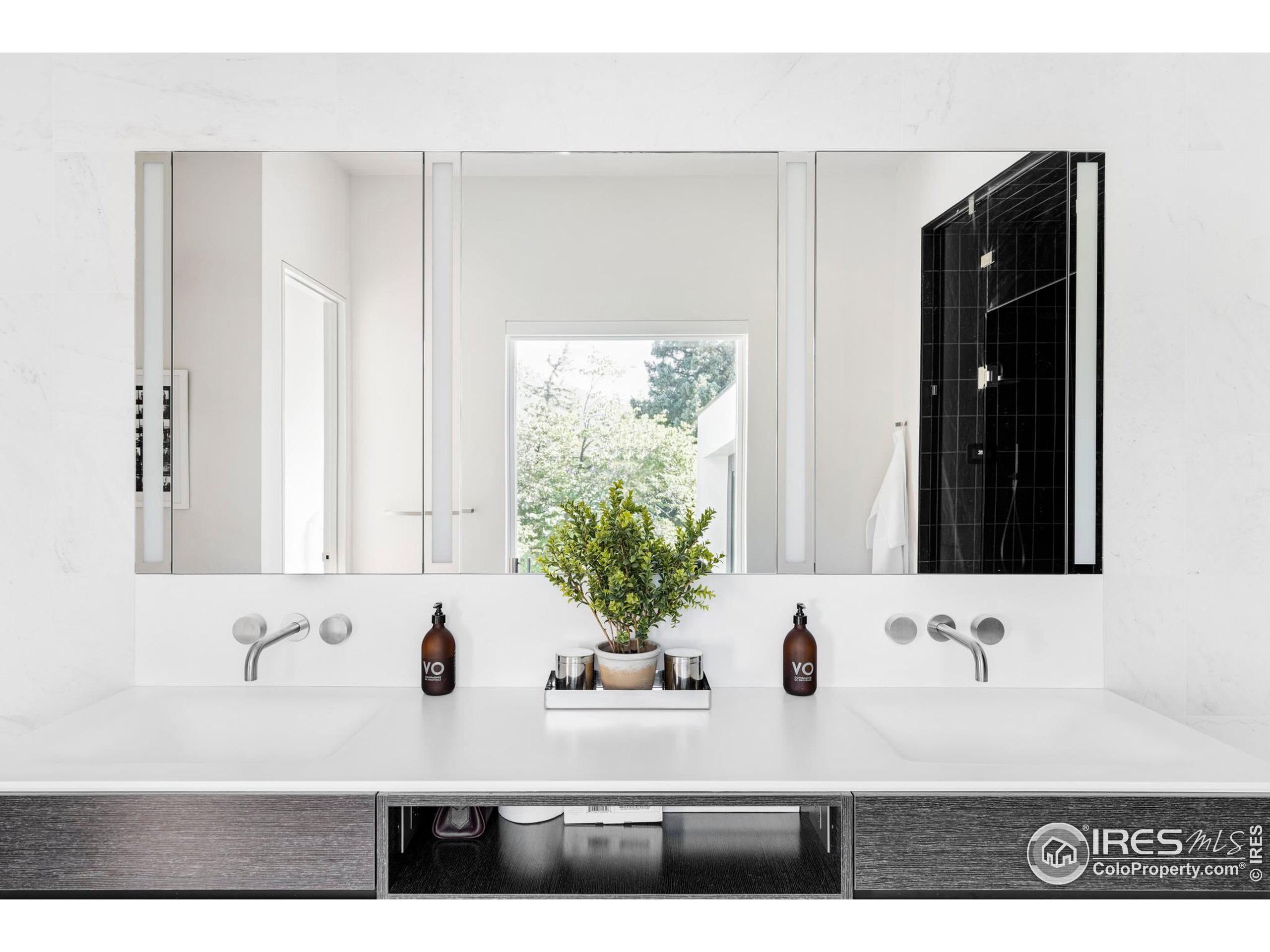 2670 6th Street Boulder, CO 80304 - Photo 18 of 30 a bathroom with a sink and a mirror
