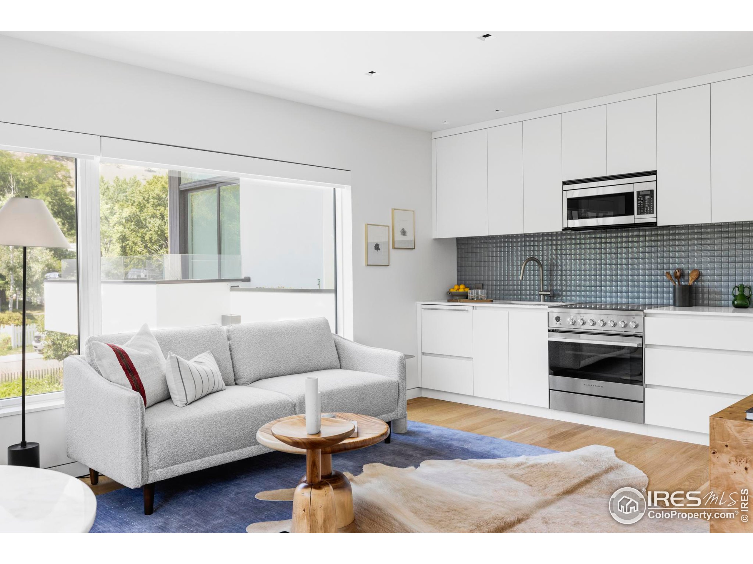 2670 6th Street Boulder, CO 80304 - Photo 23 of 30 a living room with furniture and a wooden floor