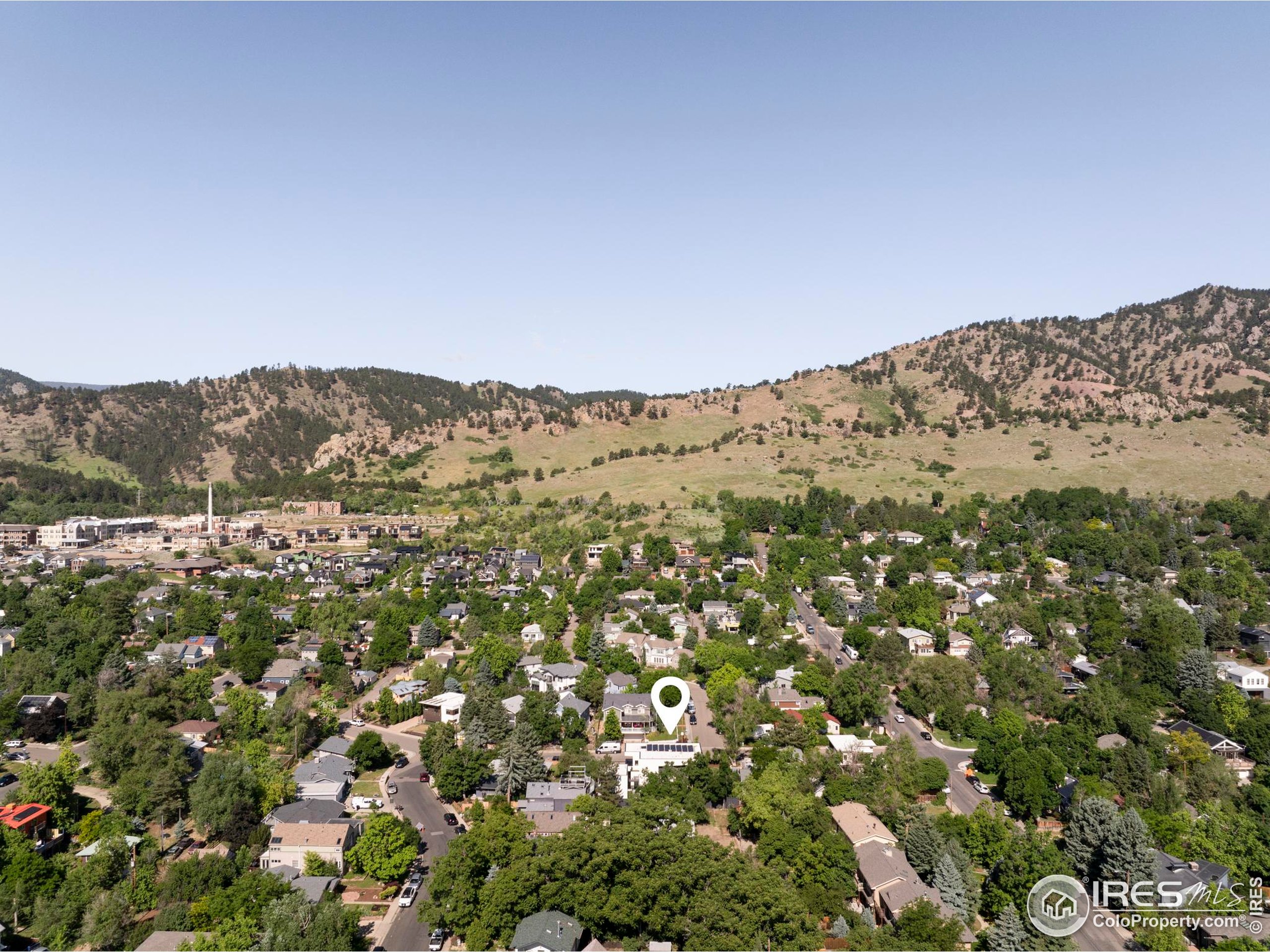 2670 6th Street Boulder, CO 80304 - Photo 28 of 30 a view of a mountain range in a cloudy sky