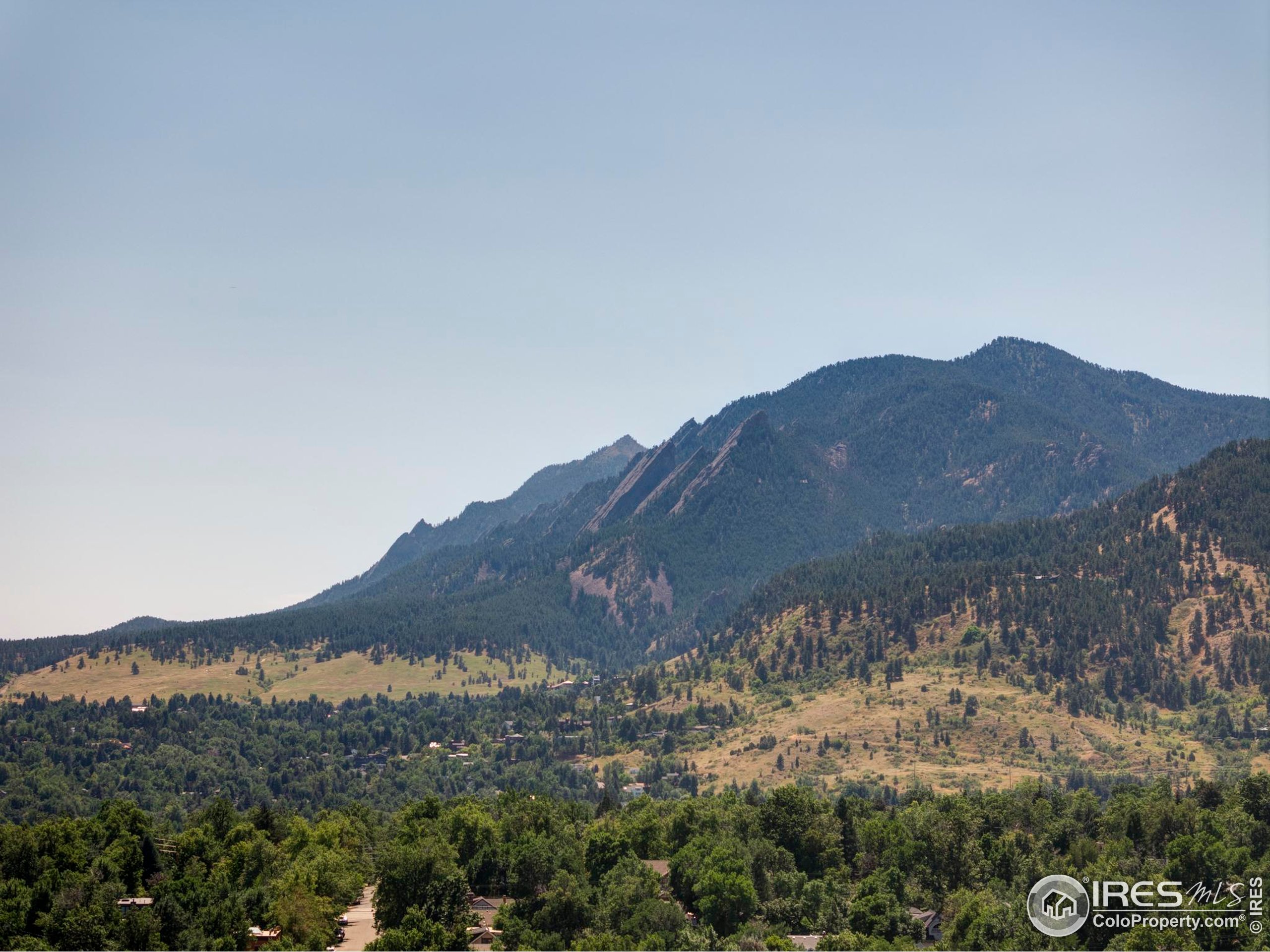 2670 6th Street Boulder, CO 80304 - Photo 30 of 30 a view of a house with a mountain in the background