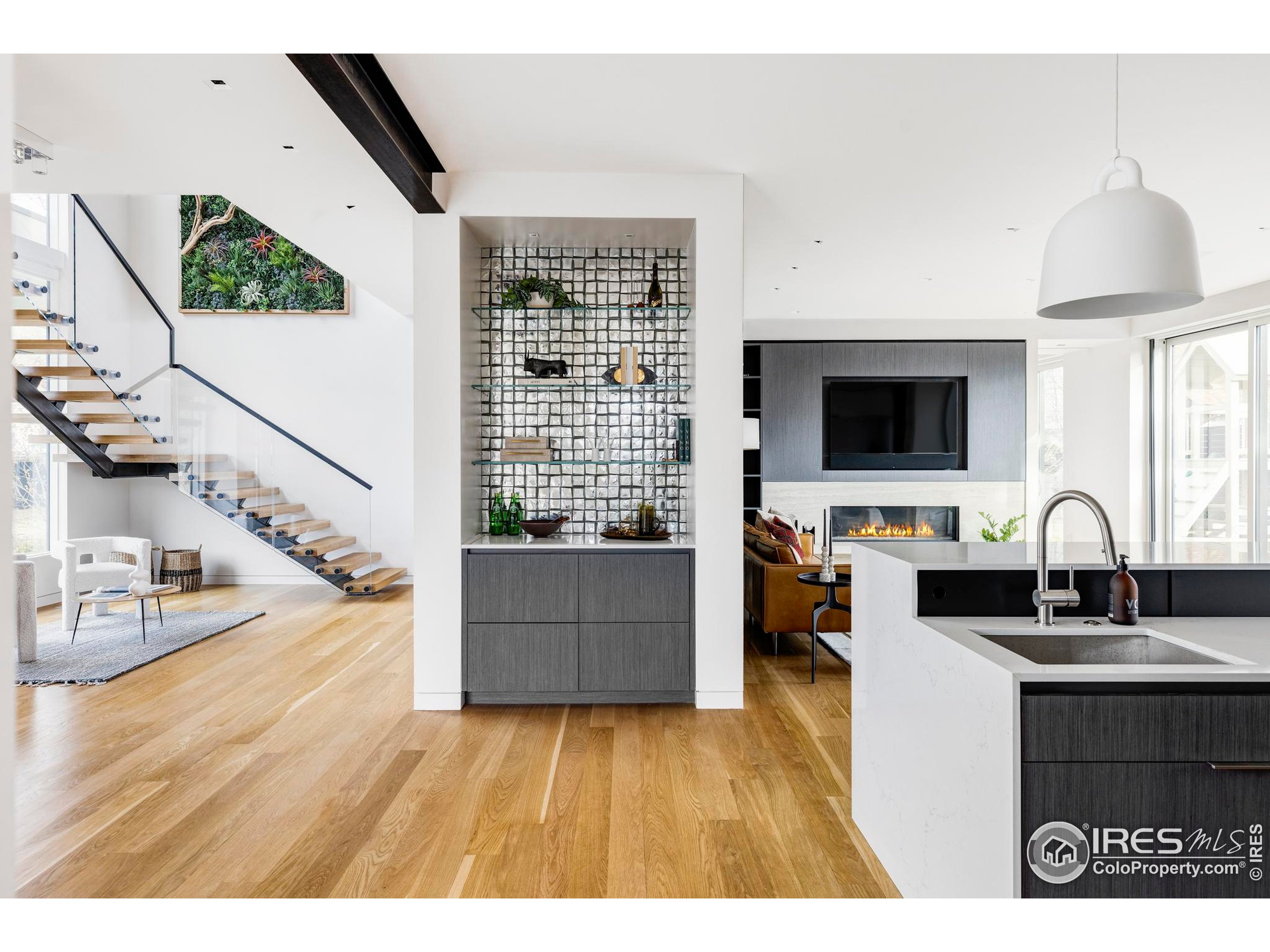 2670 6th Street Boulder, CO 80304 - Photo 4 of 30 a living room with furniture and a flat screen tv