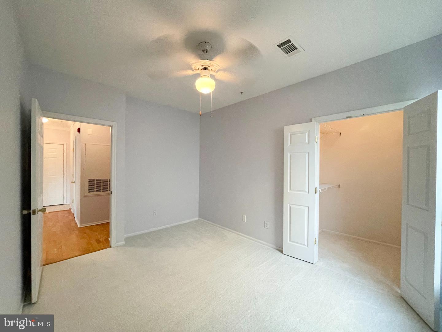 1530 Spring Gate Dr., Unit 9304 McLean, VA 22102 - Photo 37 of 72 Bedroom 2 with WIC + Fan/Light