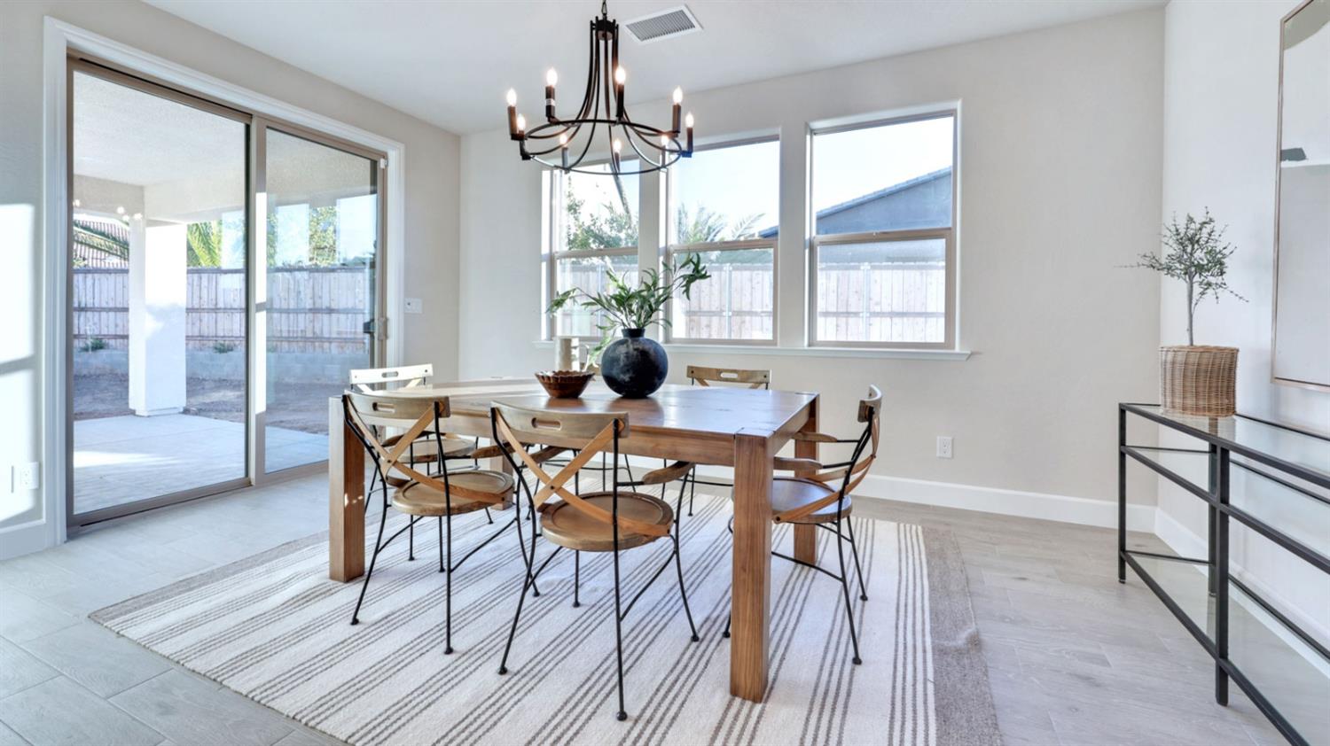 951 Talus Way South Madera, CA 93636 - Photo 12 of 36 a view of a dining room with furniture window and outside view