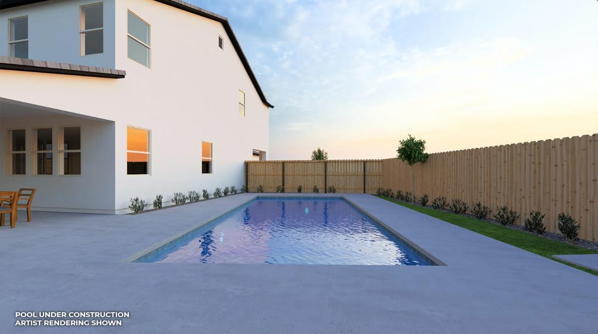 951 Talus Way South Madera, CA 93636 - Photo 2 of 36 a view of a swimming pool with a yard