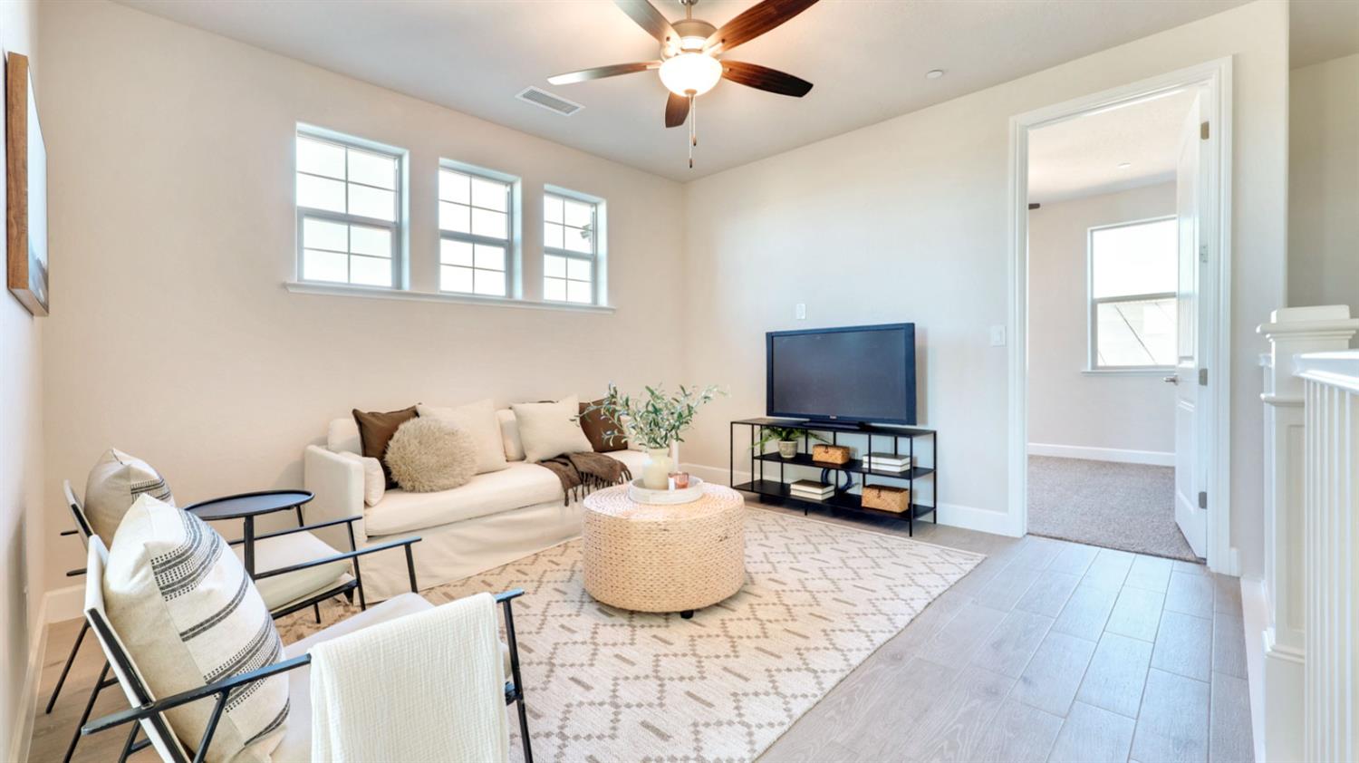 951 Talus Way South Madera, CA 93636 - Photo 24 of 36 a bedroom with furniture and a flat screen tv