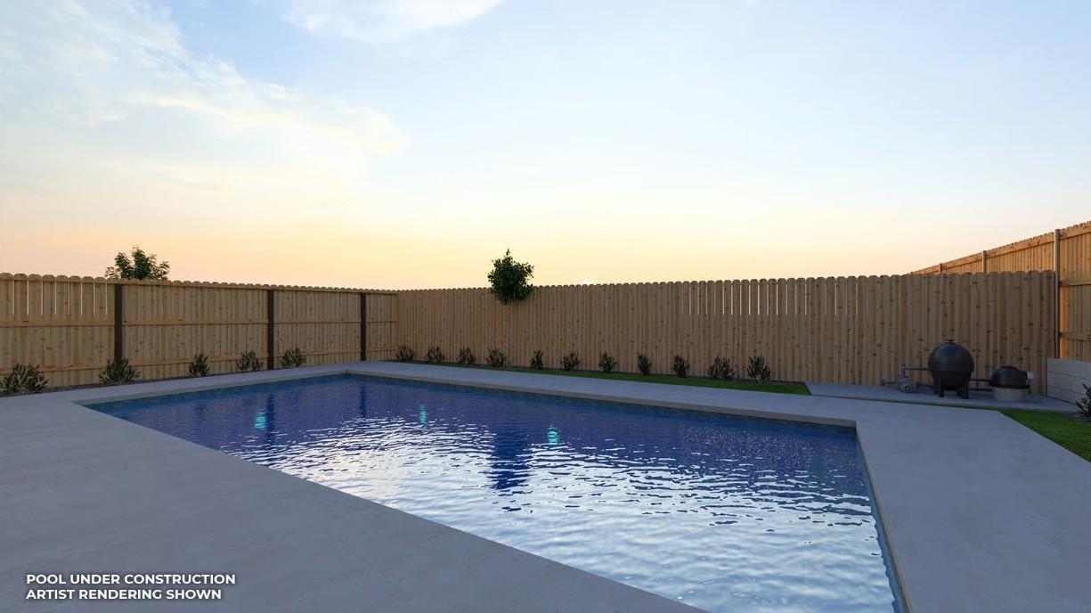 951 Talus Way South Madera, CA 93636 - Photo 3 of 36 a view of a swimming pool with a chair